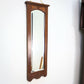 A Pair of Victorian Wall Mirrors Bevel Edged Glass Carved Top and Bottom