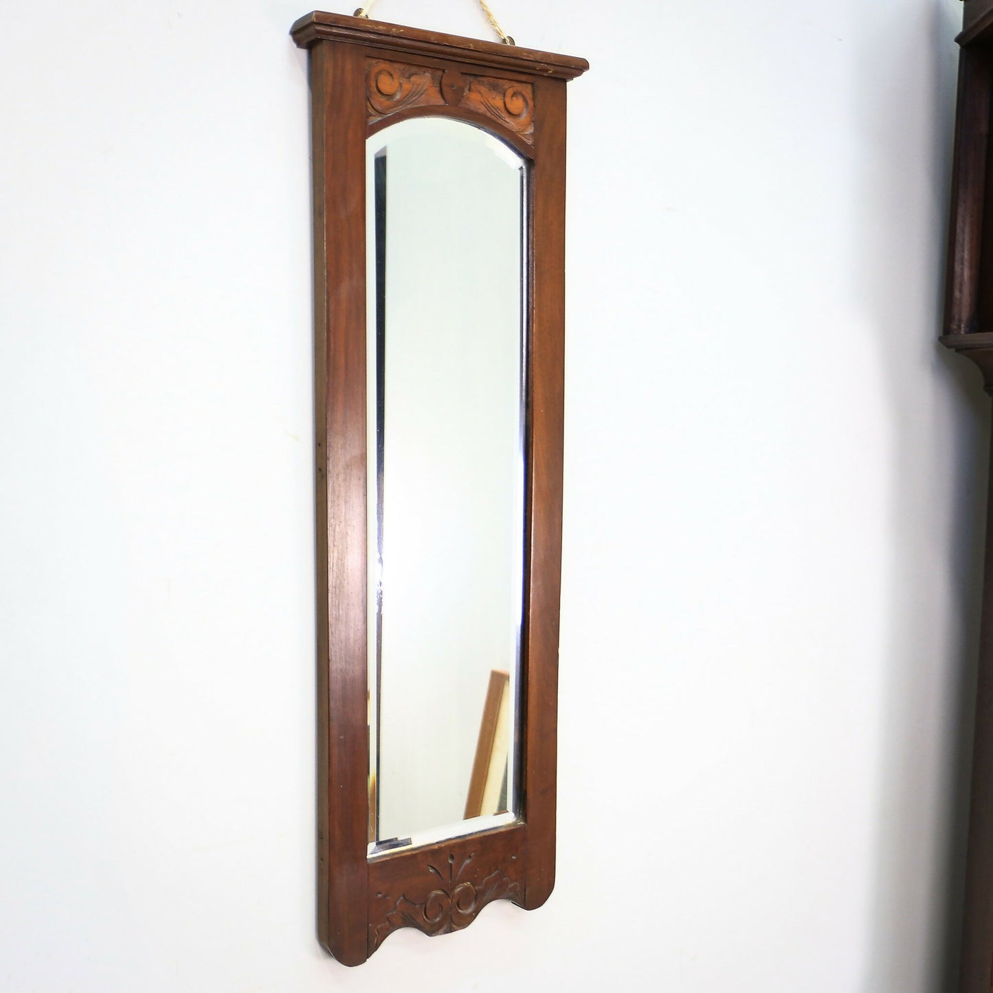 A Pair of Victorian Wall Mirrors Bevel Edged Glass Carved Top and Bottom
