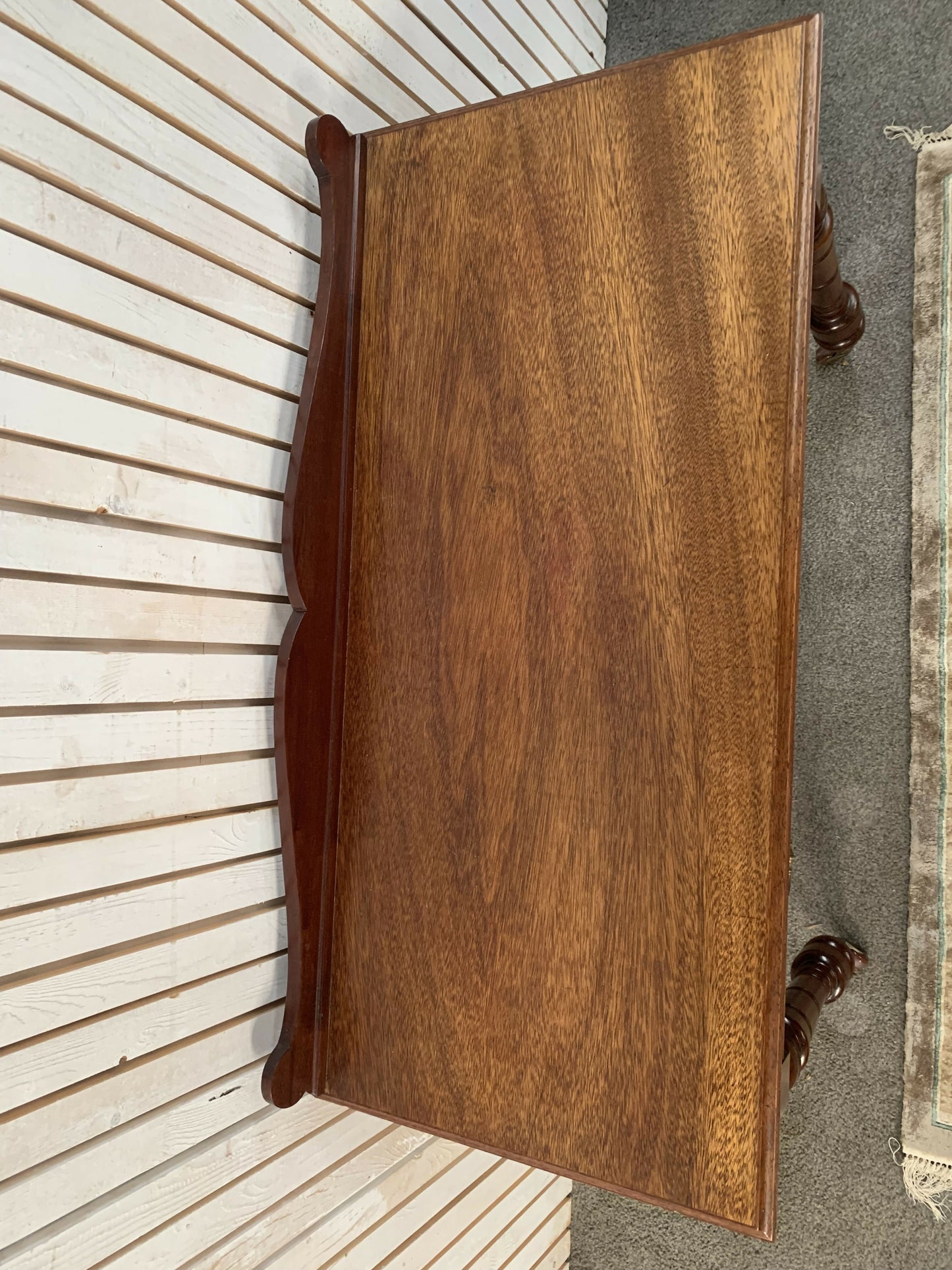 A Victorian Mahogany Writing Table/Desk With Drawer on castors.