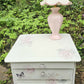 Stag Minstrel beside cabinet with 2 drawers & pullout tray painted in clotted cream