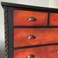 Tall chest of drawers, orange, red black