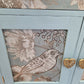 Vintage pale blue and gold drawered cupboard.