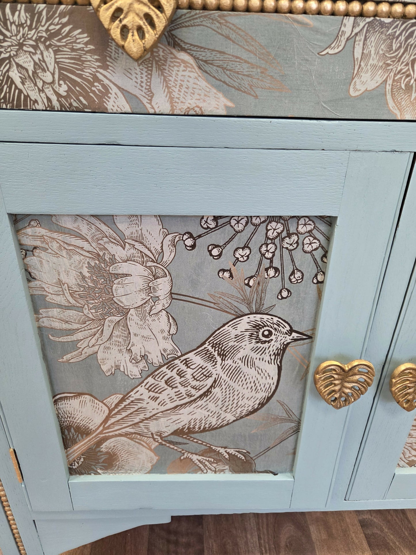 Vintage pale blue and gold drawered cupboard.