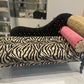 Baby chaise lounge in velvet zebra print and faux mink fur roll top