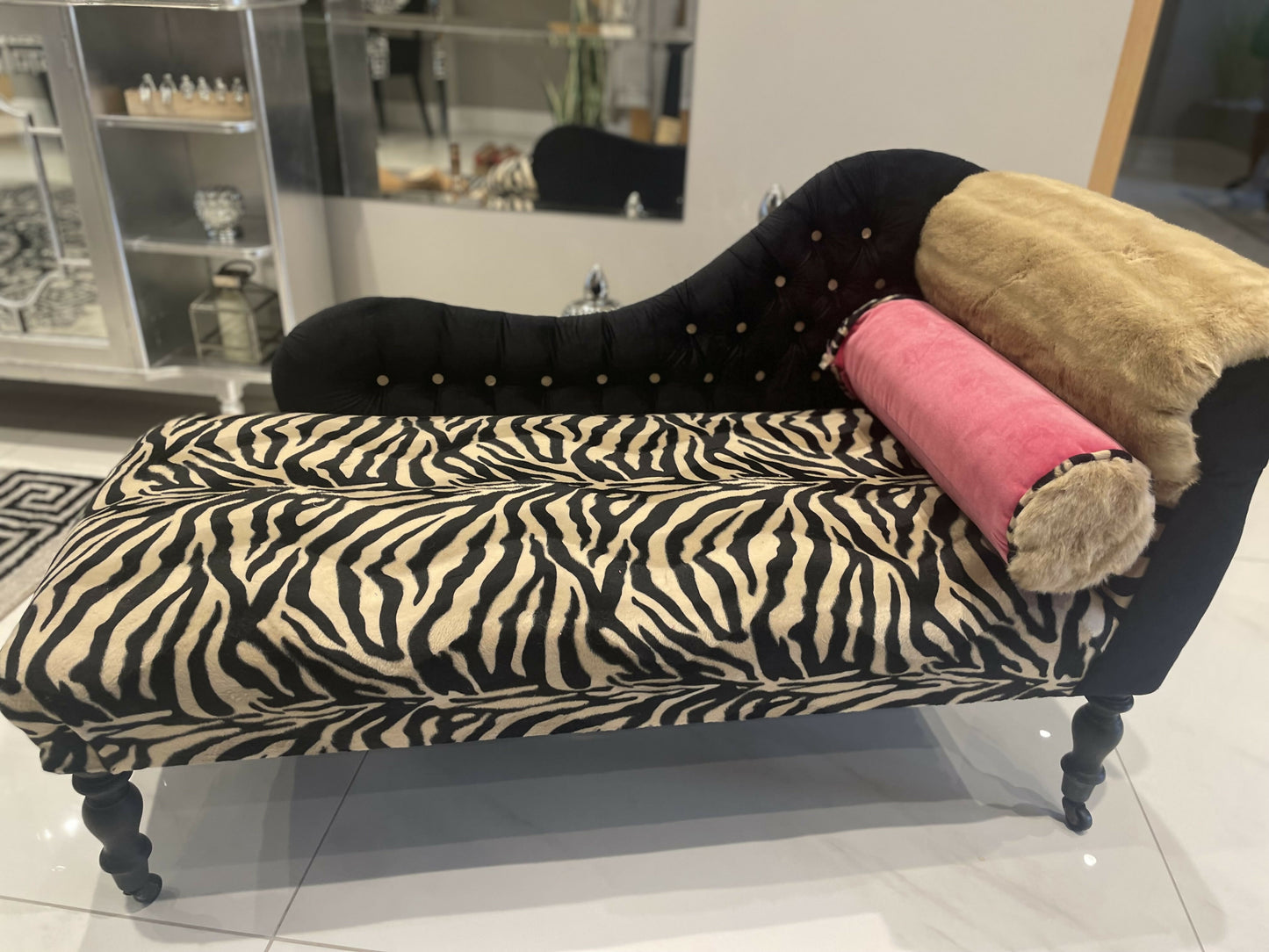 Baby chaise lounge in velvet zebra print and faux mink fur roll top