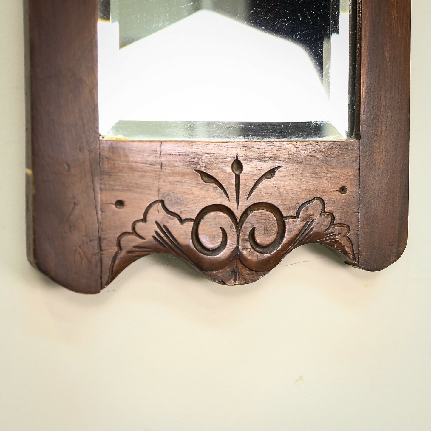 A Pair of Victorian Wall Mirrors Bevel Edged Glass Carved Top and Bottom