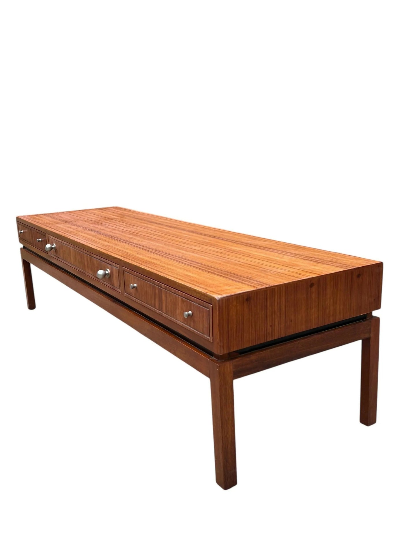 Mid-century long console coffee table by the renowned British makers Greaves and Thomas.