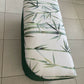 Lloyd loom ottoman. Matt Forest Green paint and matching bamboo motif fabric