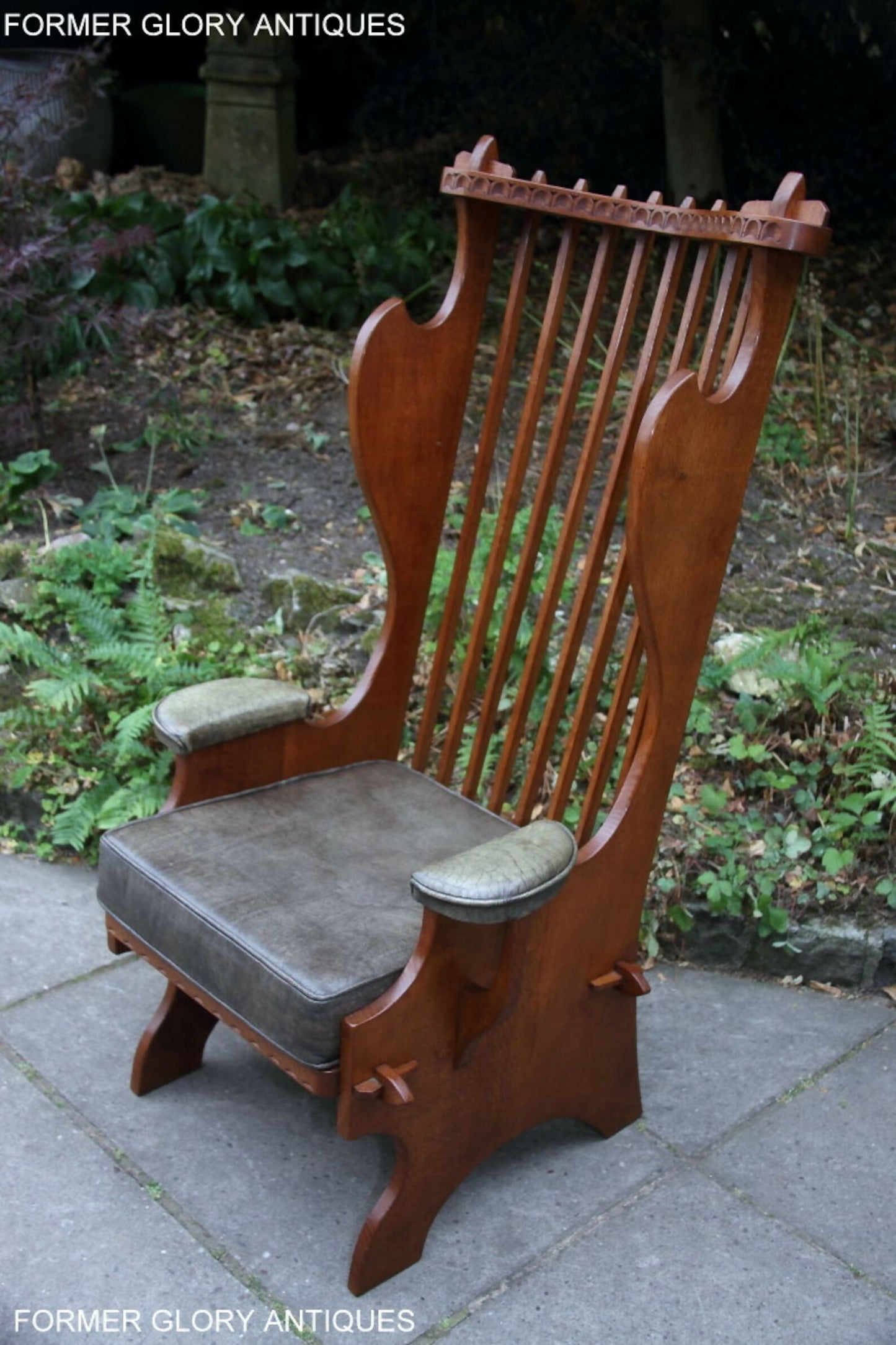 A RUPERT / NIGEL GRIFFITHS CARVED OAK DERBYSHIRE WING BACK LEATHER / ARMCHAIR