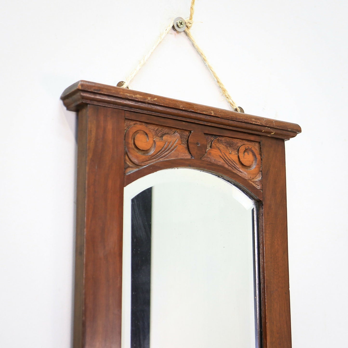 A Pair of Victorian Wall Mirrors Bevel Edged Glass Carved Top and Bottom