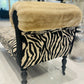 Baby chaise lounge in velvet zebra print and faux mink fur roll top