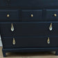 Stag minstrel black chest of drawers vintage tallboy with exposed wood top