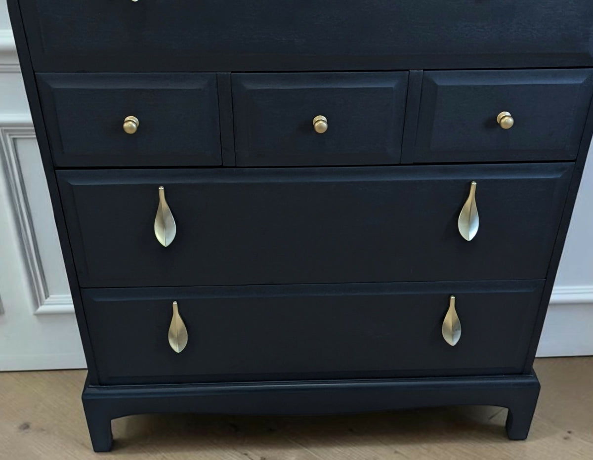 Stag minstrel black chest of drawers vintage tallboy with exposed wood top