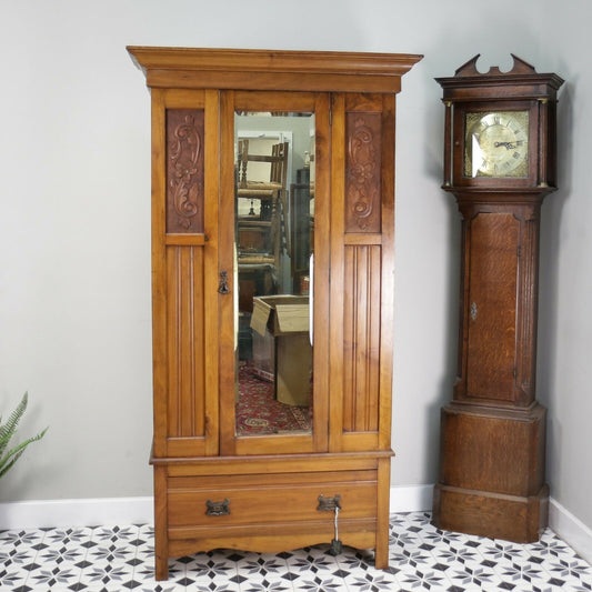 Edwardian Walnut and Carved Mahogany Wardrobe with Bevel Edged Mirrors & Drawer