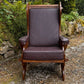 A NIGEL RUPERT GRIFFITHS MONASTIC CARVED OAK LEATHER FIRESIDE CHAIR / ARMCHAIR