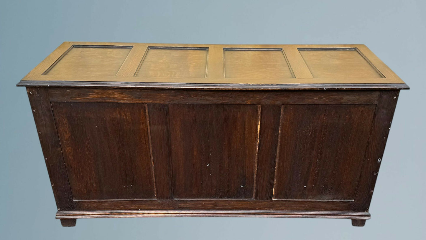 A Large Carved Oak Bedding or Blanket Box With Raised Linen Fold Panels