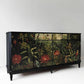 Vintage Strongbow sideboard painted black and front decorated with jungle design