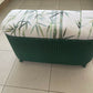 Lloyd loom ottoman. Matt Forest Green paint and matching bamboo motif fabric