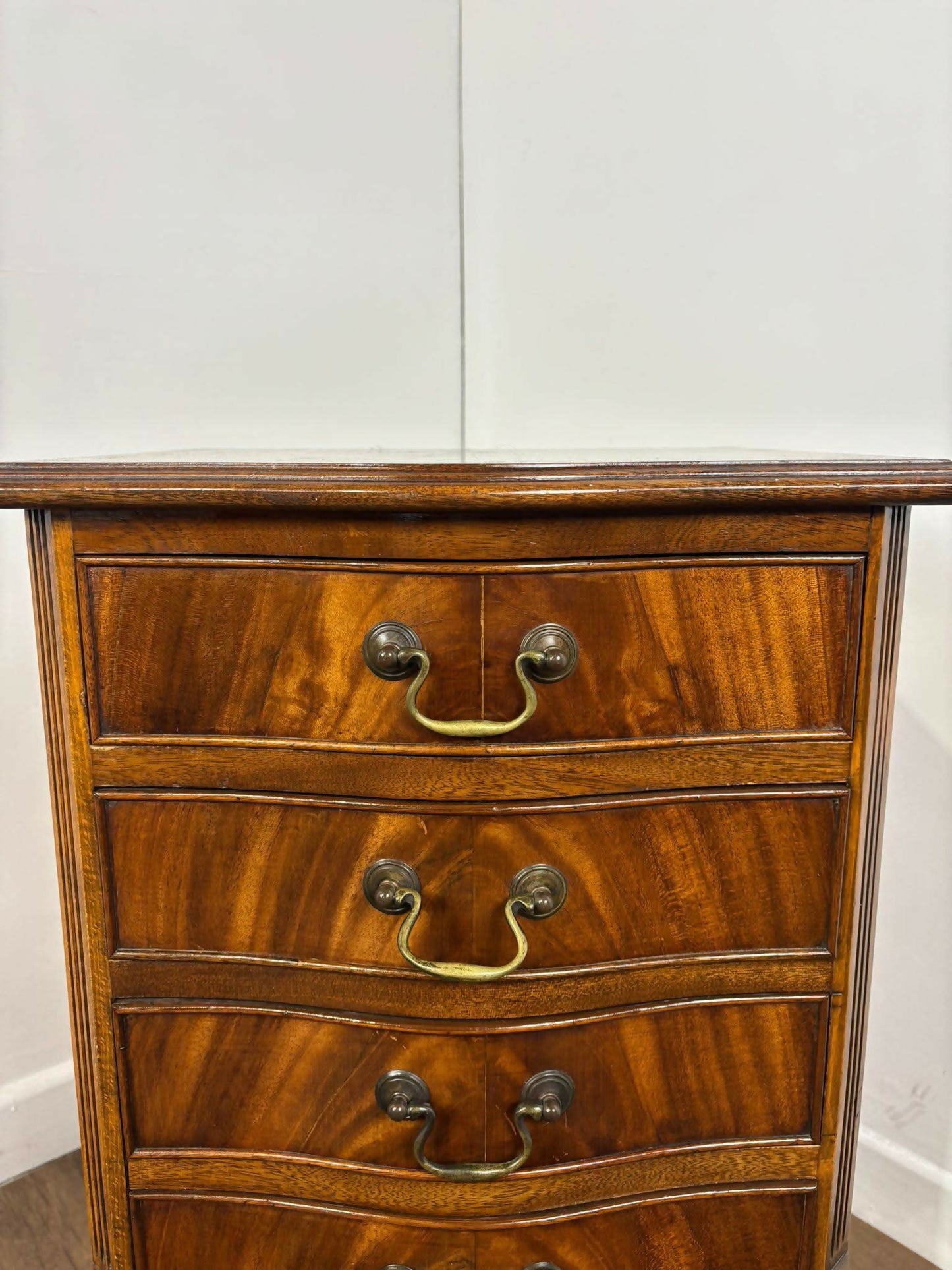 Reproduction Serpentine Front Four Drawer Chest