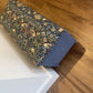 William morris style material topped mid century Ottoman.