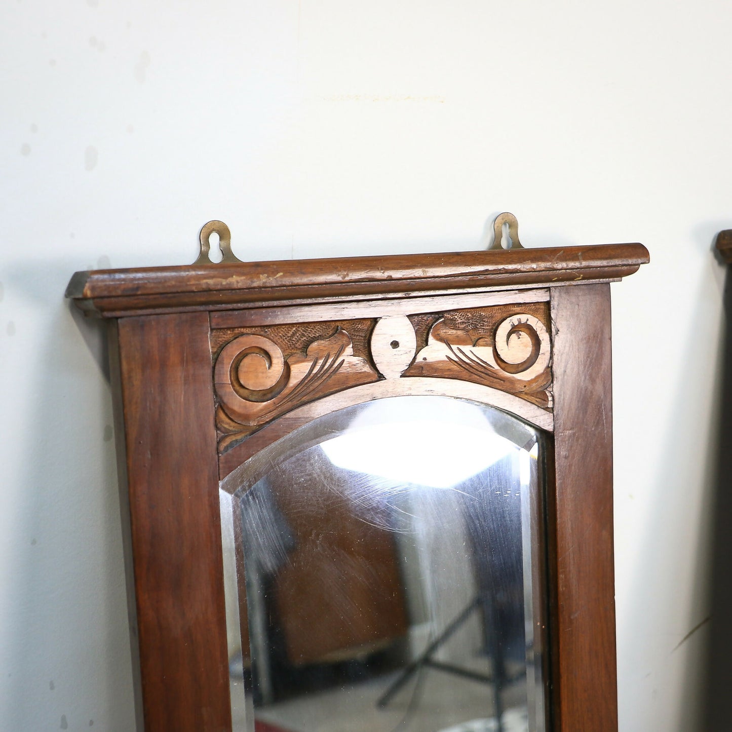 A Pair of Victorian Wall Mirrors Bevel Edged Glass Carved Top and Bottom