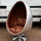 Aviation Swivel Egg Chair With Tan Leather.