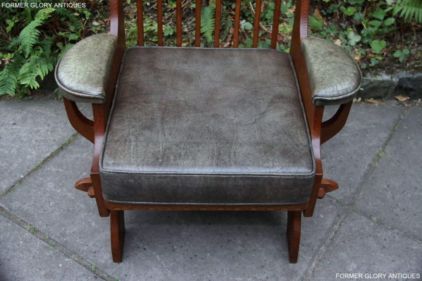 A RUPERT / NIGEL GRIFFITHS CARVED OAK DERBYSHIRE WING BACK LEATHER / ARMCHAIR