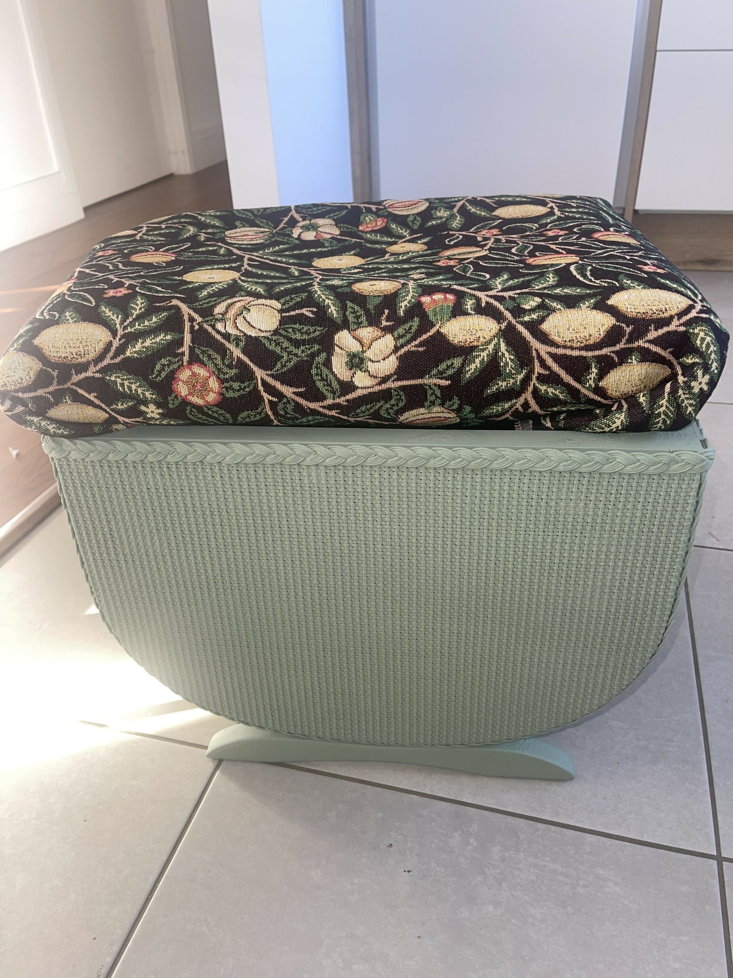Small mid century Ottoman storage and seat. Sage green paint makes you choose the material.