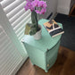 Occasional or bedside table. Green paint. Glass top.