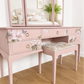 Dusky blush pink Stag Minstrel dressing table set with blossom and butterfly design.
