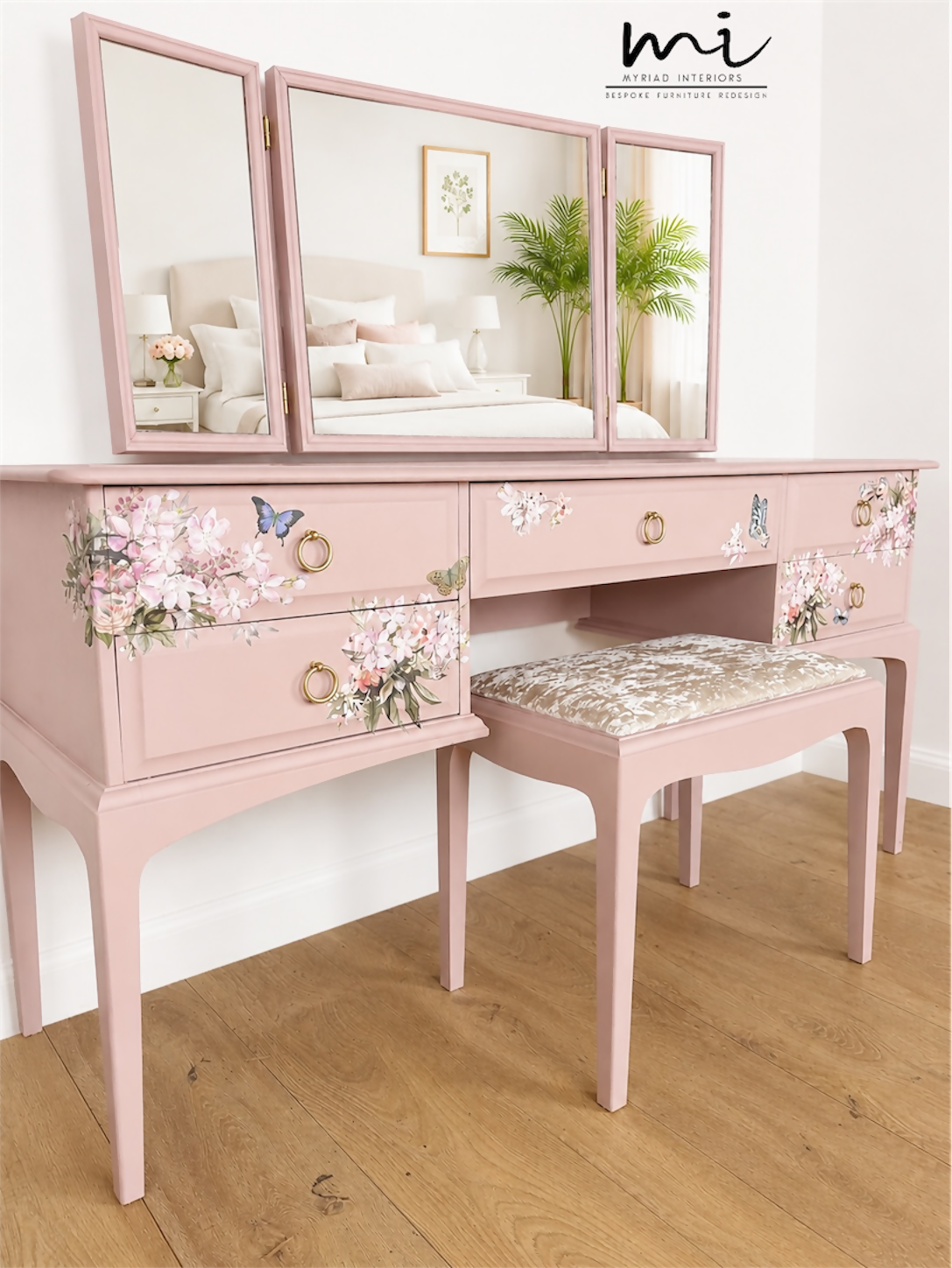 Dusky blush pink Stag Minstrel dressing table set with blossom and butterfly design.