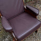 A NIGEL RUPERT GRIFFITHS MONASTIC CARVED OAK LEATHER FIRESIDE CHAIR / ARMCHAIR