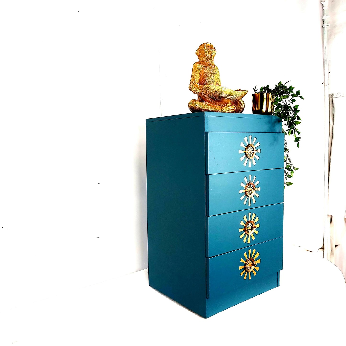 Upcycled hand painted drawers in teal with gold leaf design