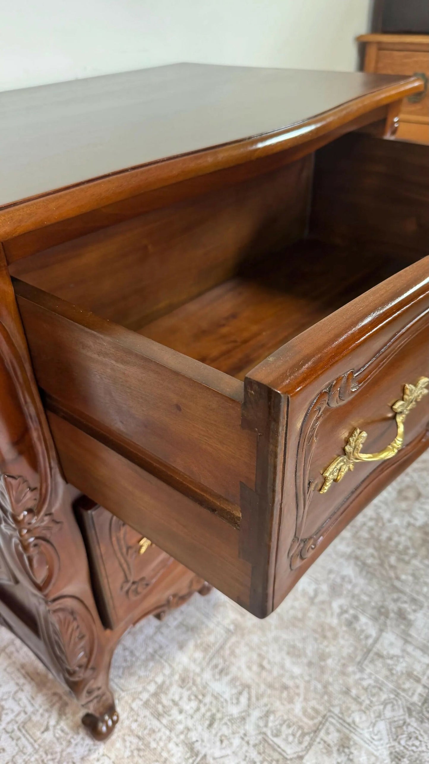 French Rococo style carved mahogany chest of drawers