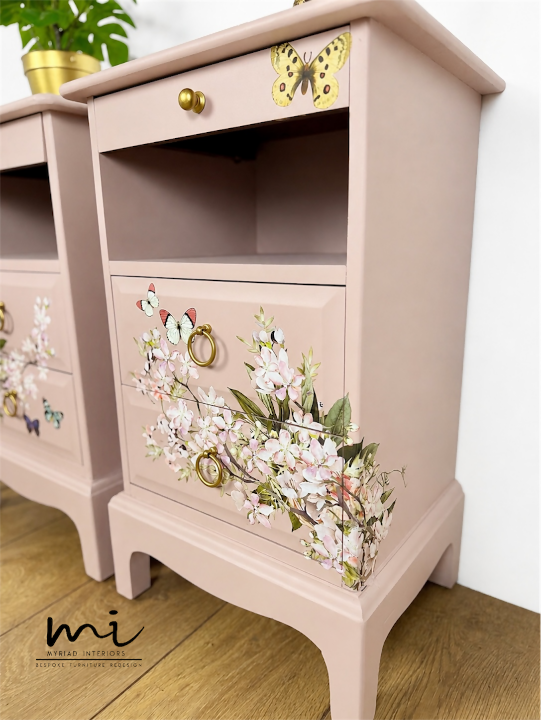 Dusky blush pink Stag Minstrel slim tea tray bedside tables with blossom and butterfly design. Nightstands pale pink