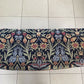 Kraft mid century Ottoman. Newly painted black. William Morris style material.