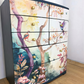 Beautiful watercolour floral mural extra large chest of drawers in a deep teal navy blue. Solid wood, botanical sideboard
