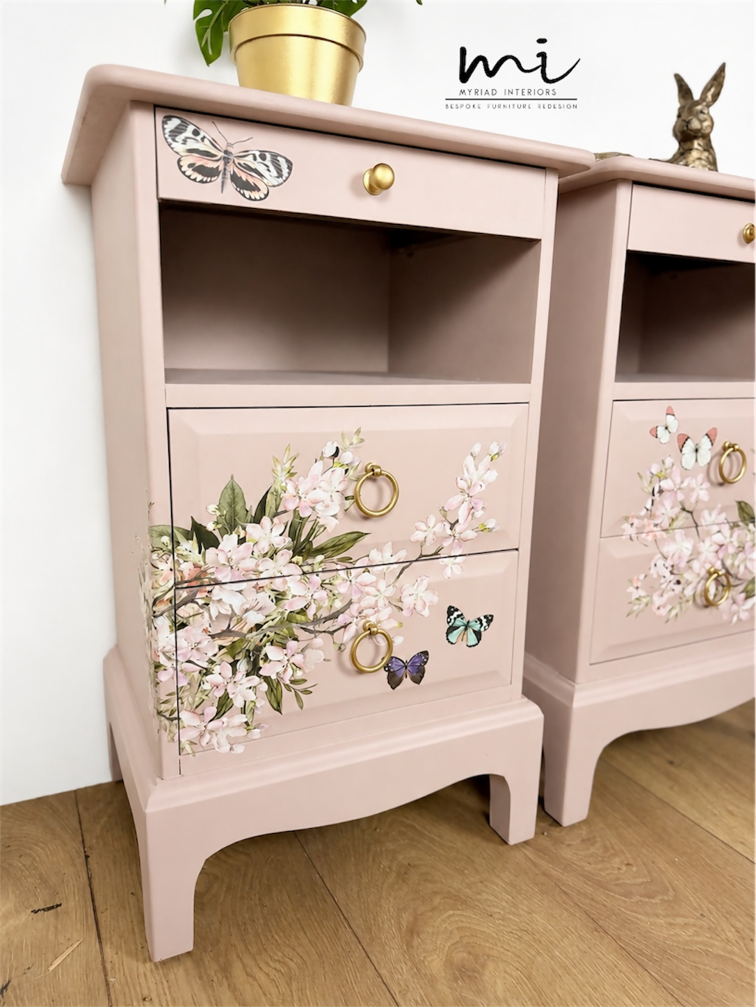 Dusky blush pink Stag Minstrel slim tea tray bedside tables with blossom and butterfly design. Nightstands pale pink
