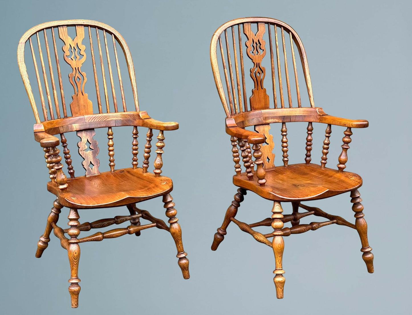 A Large Pair of Ash Broad Arm Windsor Chairs