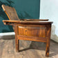 Adjustable Decorative Chair with Tribal Inspired Carvingsdf