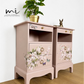 Dusky blush pink Stag Minstrel slim tea tray bedside tables with blossom and butterfly design. Nightstands pale pink