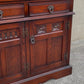 A WOOD BROTHERS OLD CHARM TUDOR BROWN CARVED OAK SIDEBOARD / DRESSER BASE / CUPBOARD / CABINET.