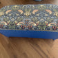 Mid century bright blue repainted ottoman with new William Morris style fabric