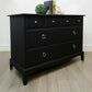 Stag minstrel chest of drawers in black