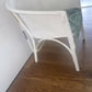 white accent chair with velvety tree pattern seat