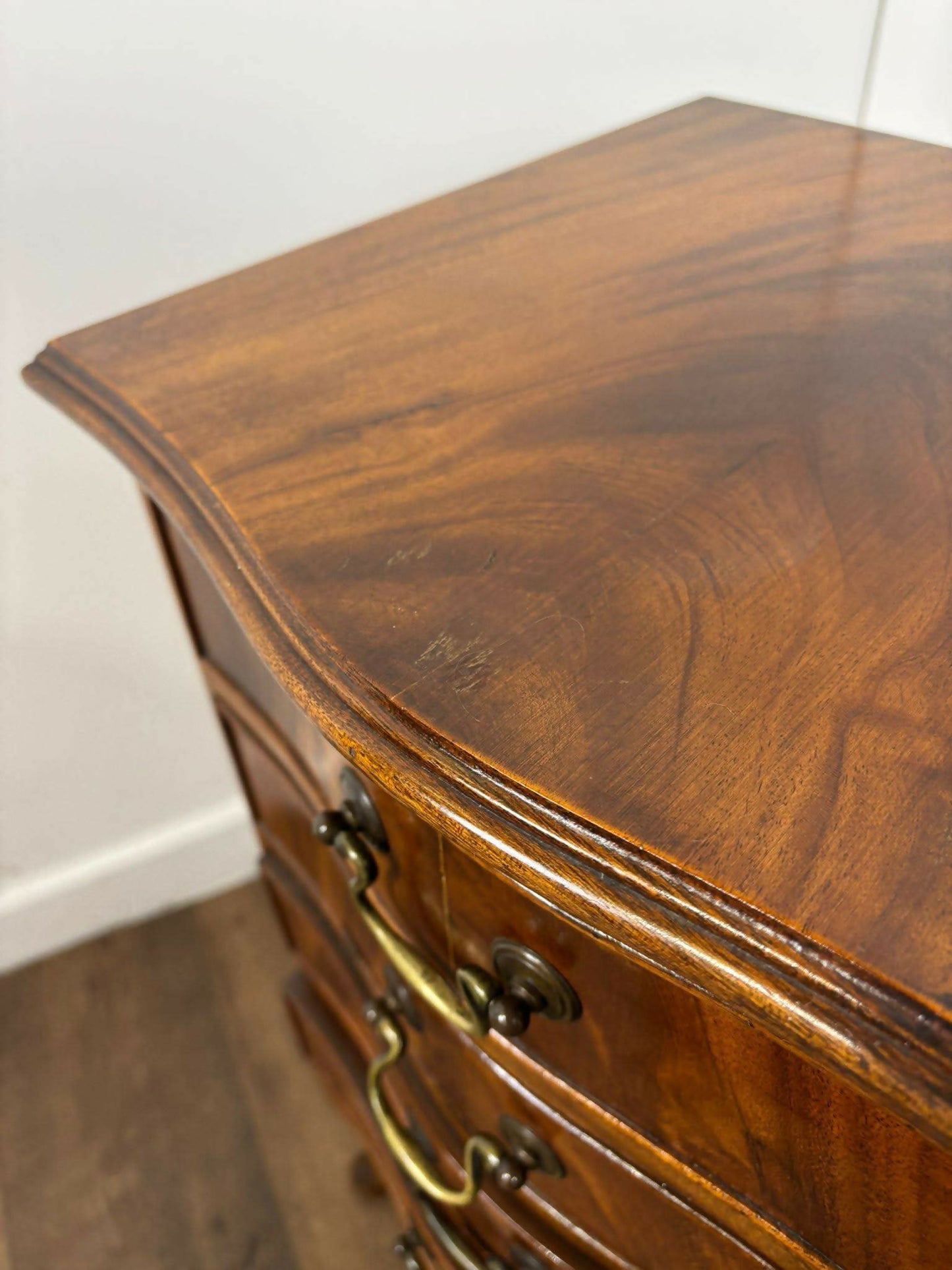 Reproduction Serpentine Front Four Drawer Chest