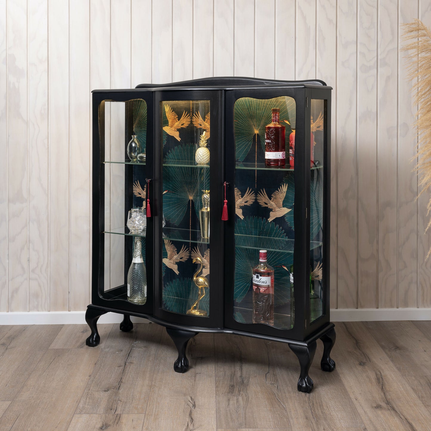 Available: Exquisite Art Deco drinks cabinet decoupaged in a striking blend of emerald green, subltle gold and black crane fabric.