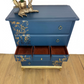 Refinished Stag Minstrel Tallboy Chest Of Drawers In Navy Blue With Gold Foil Floral Bird Design