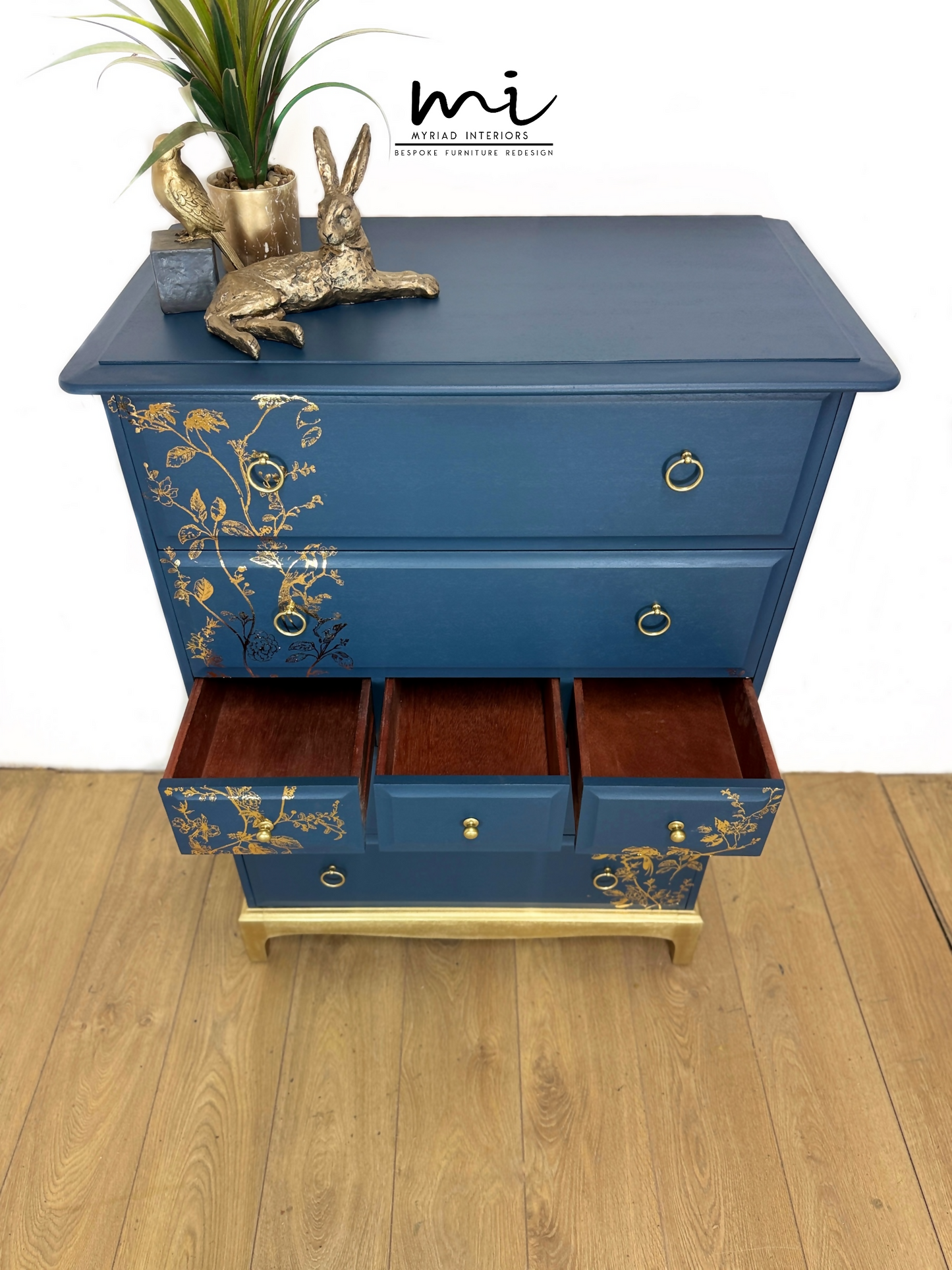Refinished Stag Minstrel Tallboy Chest Of Drawers In Navy Blue With Gold Foil Floral Bird Design