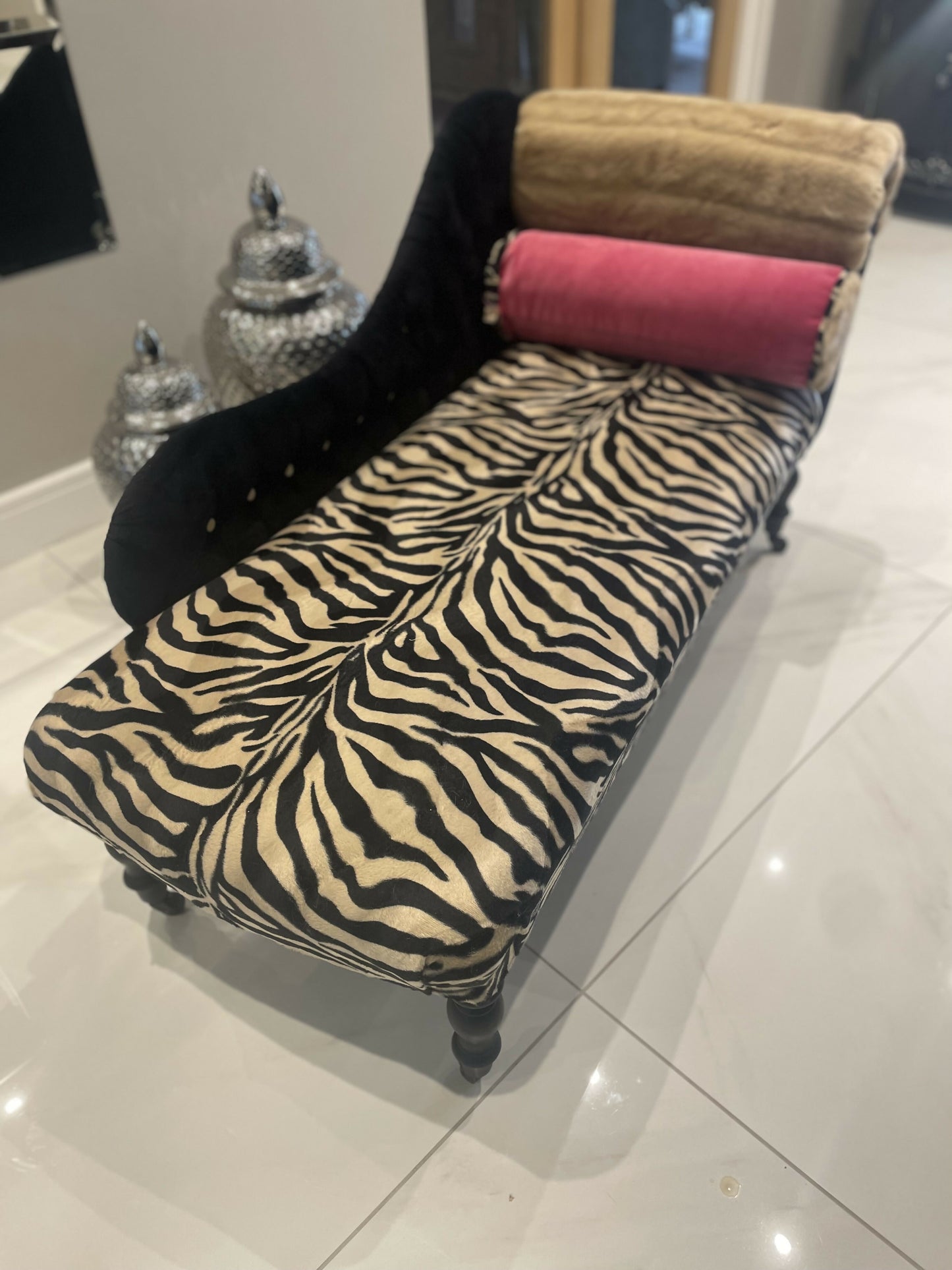 Baby chaise lounge in velvet zebra print and faux mink fur roll top